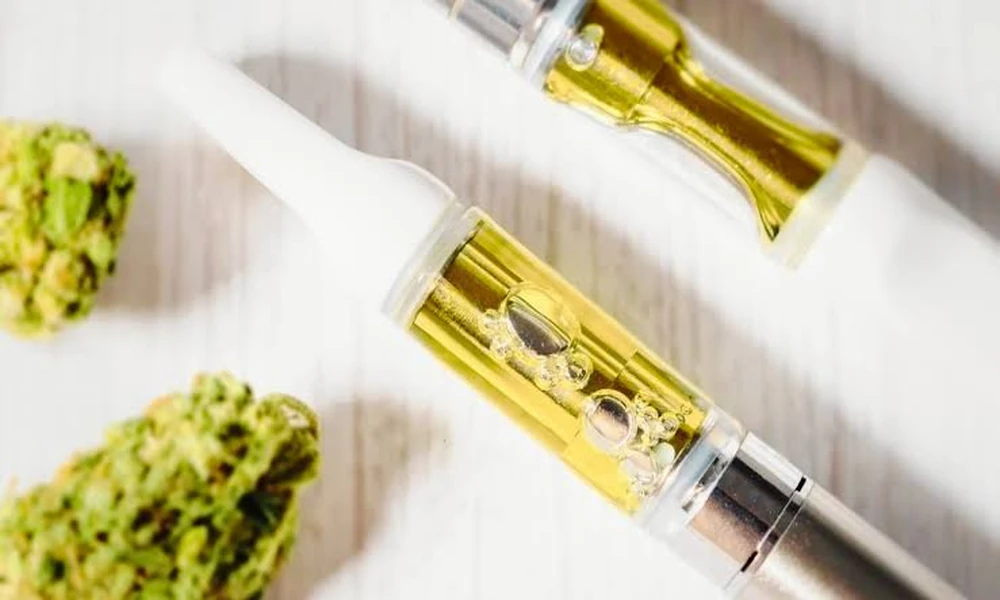How does coil material affect a 2-gram cart output?